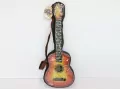 Gitara w pokrowcu - tantis.pl