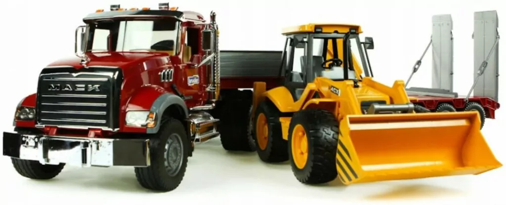 MACK z naczepą i koparko-ładowarką JCB - tantis.pl