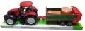 Traktor z maszyną rolniczą - tantis.pl