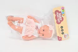 Lalka bobas w różowej sukience z koronką