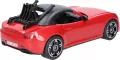 Auto Roadster czerwone z figurką kolarki i rowerem - tantis.pl