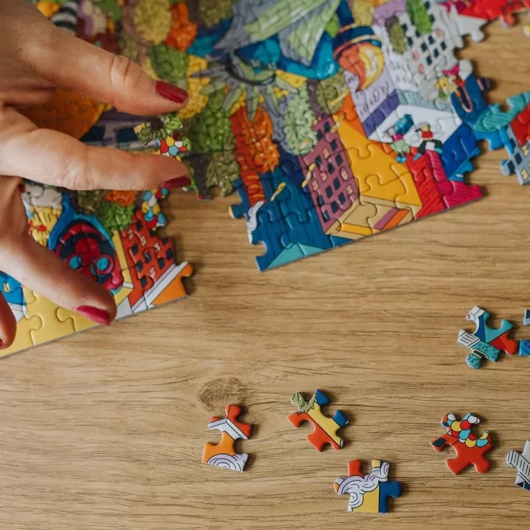 Puzzle 1000. Eye-Spy Sneaky Peekers Amsterdam TREFL - tantis.pl