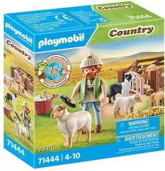 Młody owczarz z owcami. Country 71444