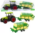 Traktor rolniczy przyczepą zielono-żółtą - tantis.pl