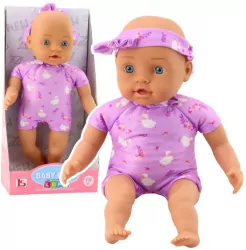 Niemowlę w fioletowym body miękki brzuszek