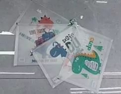 Teczka A4 plastikowa zapinana dinozaury - tantis.pl