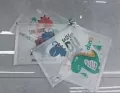 Teczka A4 plastikowa zapinana dinozaury - tantis.pl