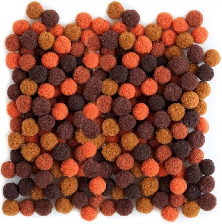 Pompony poliestrowe 1cm mix brązowy 120szt - tantis.pl
