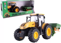 Traktor rolniczy z rozsiewaczem