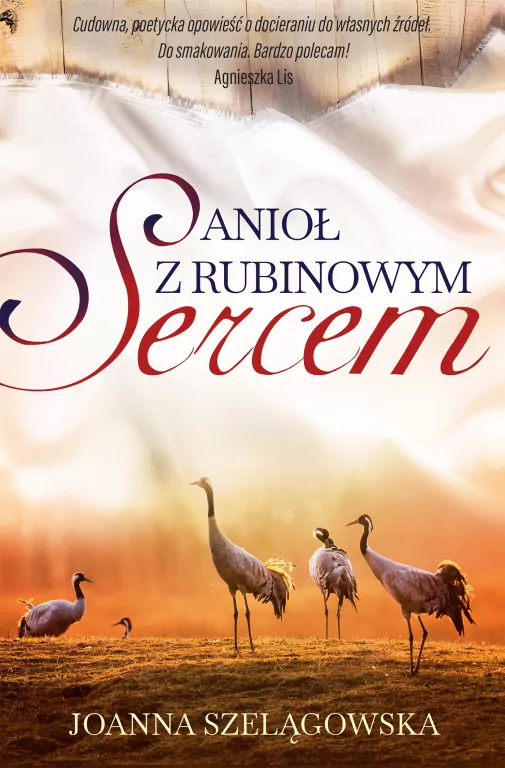 Anioł z rubinowym sercem - tantis.pl