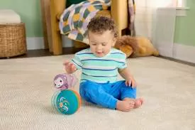 Fisher-Price Fioletowa Małpka Piłeczka - tantis.pl