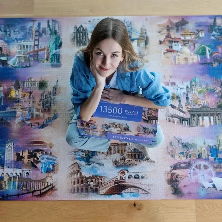 Trefl. Puzzle 13500. Cities Beyond the Clouds - tantis.pl