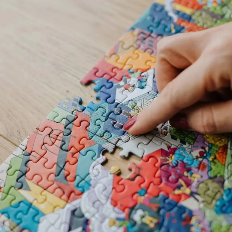 Puzzle 1000. Eye-Spy Sneaky Peekers Amsterdam TREFL - tantis.pl
