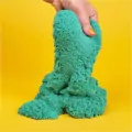 Kinetic Sand. Piasek kinetyczny z brokatem. Turkusowy 90g - tantis.pl